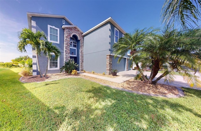 view of front facade featuring a garage and a front yard