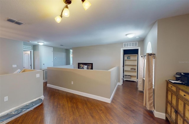 interior space featuring dark wood-type flooring