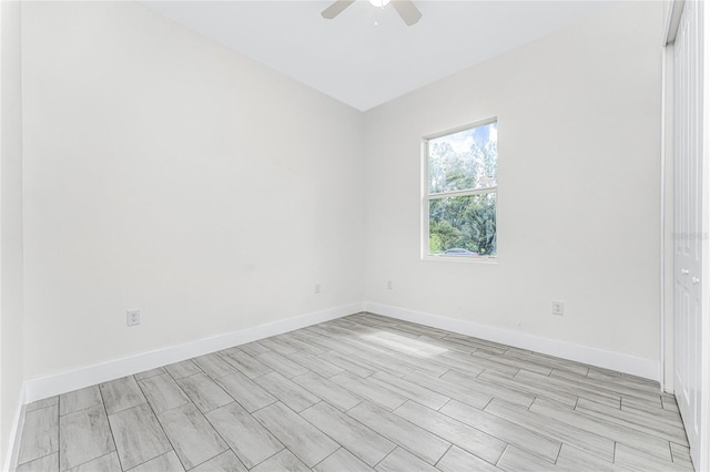 spare room with ceiling fan and light hardwood / wood-style floors