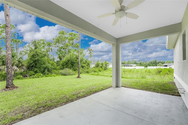 view of patio featuring ceiling fan