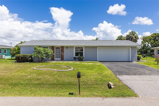 ranch-style house featuring central AC, a front yard, and a garage