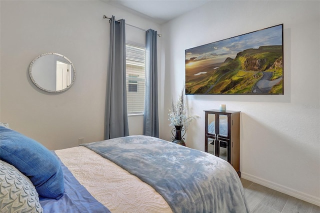 bedroom featuring hardwood / wood-style floors