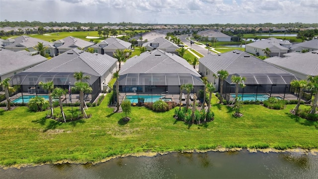 drone / aerial view with a water view