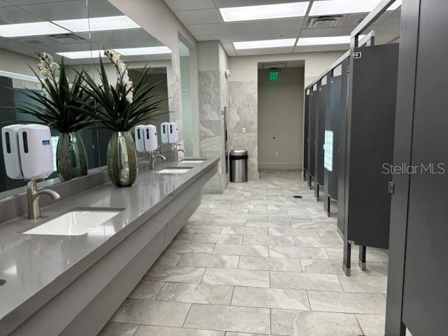 bathroom featuring vanity and a paneled ceiling