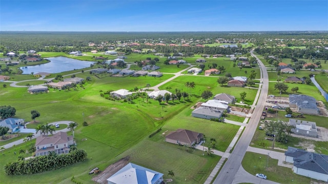 aerial view with a water view and a residential view