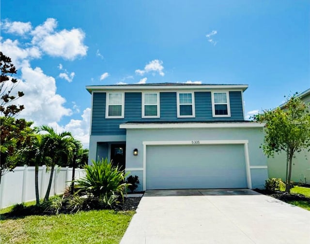 front facade with a garage