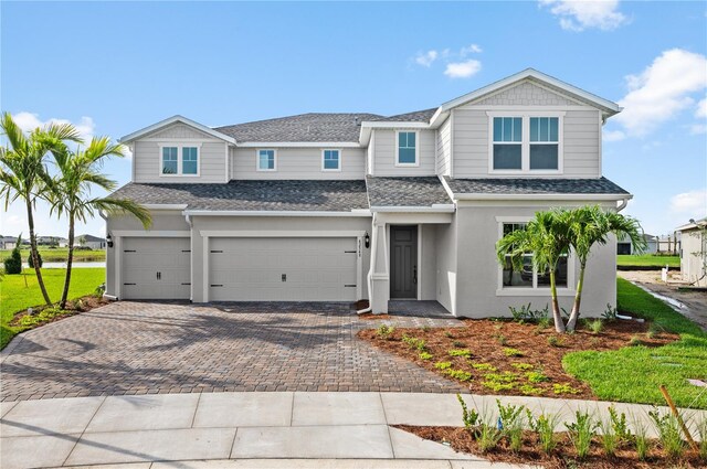 view of front of home with a garage