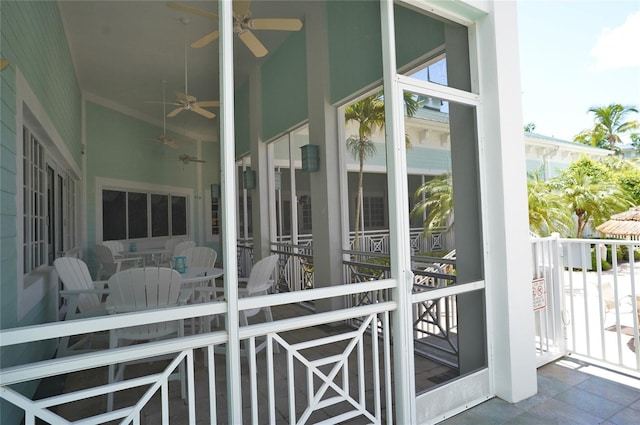 balcony featuring a ceiling fan