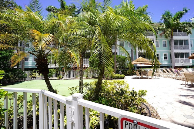 exterior space featuring a patio area and fence