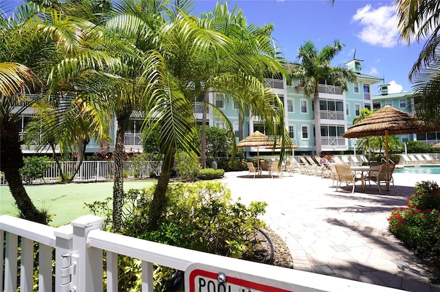 surrounding community featuring a patio, a swimming pool, and a gazebo