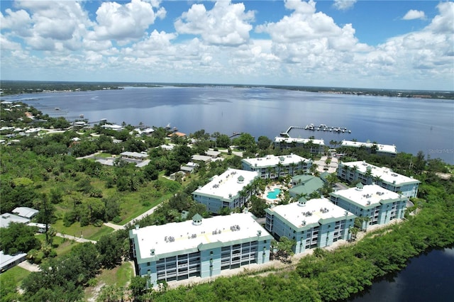 drone / aerial view with a water view