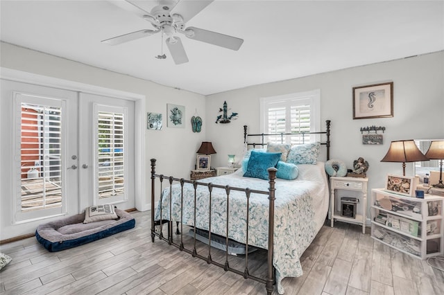 bedroom featuring ceiling fan, hardwood / wood-style flooring, and access to exterior