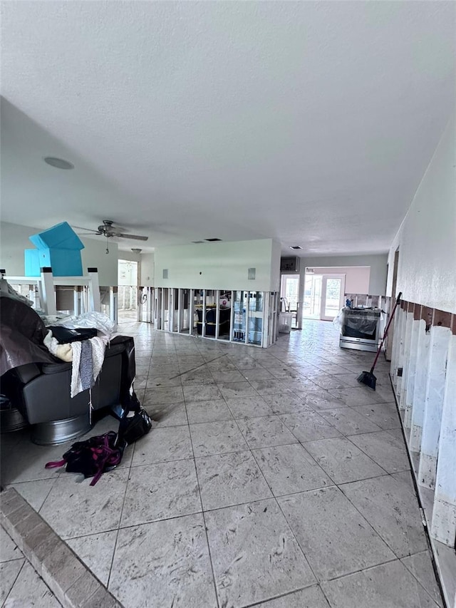 living room featuring ceiling fan