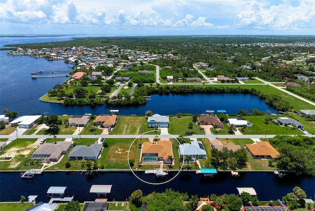 bird's eye view with a water view