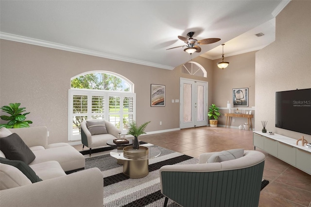 tiled living room featuring ornamental molding, vaulted ceiling, and ceiling fan