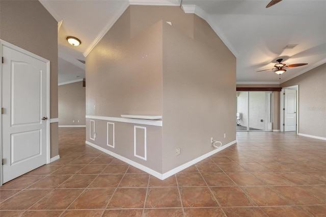 tiled empty room with ceiling fan and ornamental molding