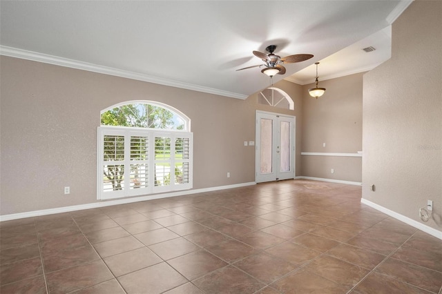 tiled empty room featuring crown molding and ceiling fan