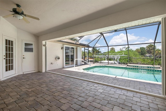 view of pool with a patio area and ceiling fan