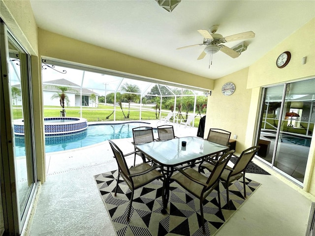 sunroom / solarium with ceiling fan