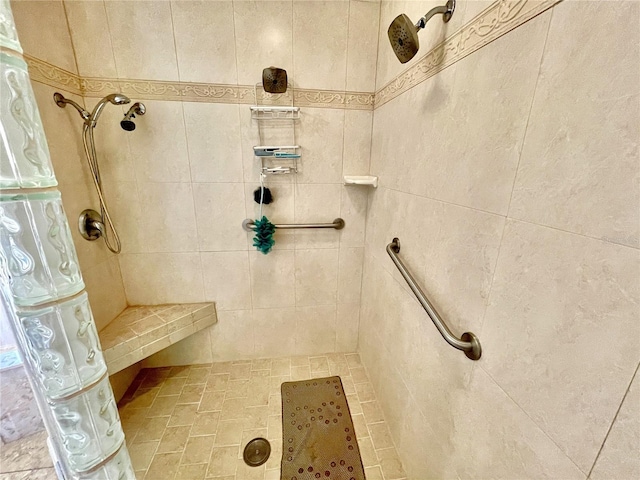 bathroom featuring a tile shower