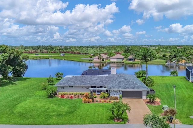 birds eye view of property featuring a water view