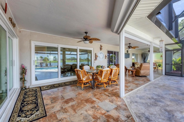 sunroom / solarium with a wealth of natural light