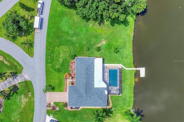 drone / aerial view with a water view