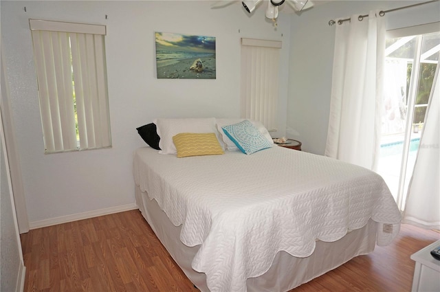 bedroom with wood-type flooring