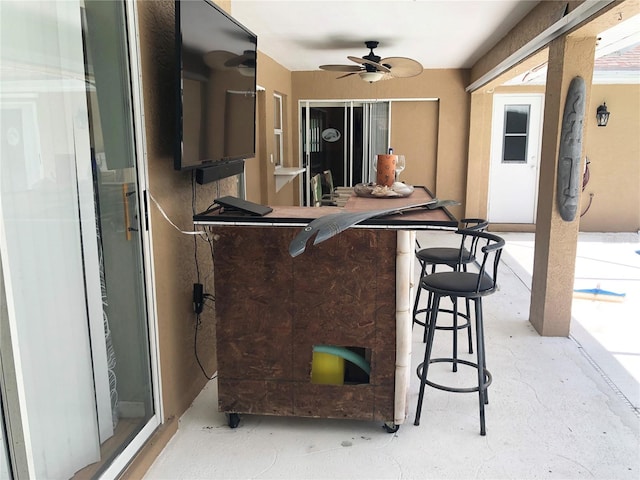 view of patio / terrace with ceiling fan