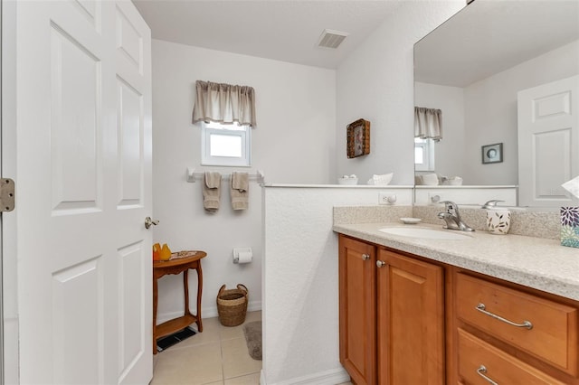 bathroom featuring vanity and tile patterned flooring