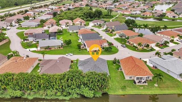 drone / aerial view featuring a water view