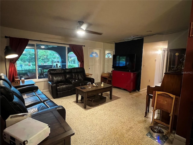 living room with ceiling fan