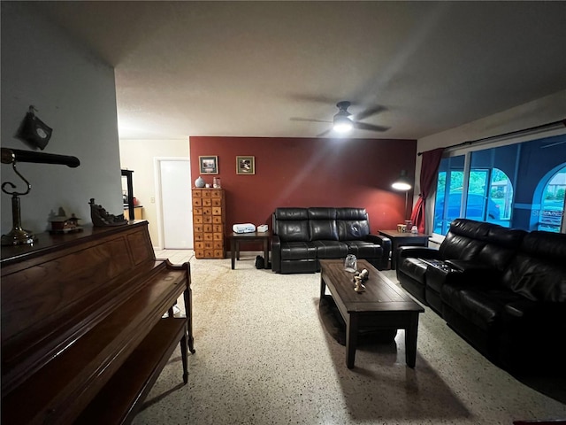 living room featuring ceiling fan