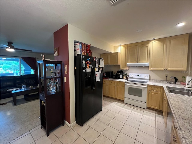 kitchen featuring electric stove, sink, light tile patterned floors, black refrigerator with ice dispenser, and light brown cabinets