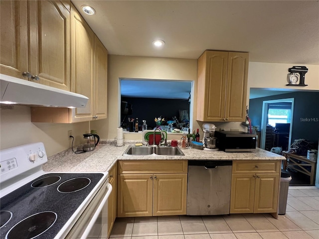 kitchen with stainless steel appliances, sink, light brown cabinets, and light tile patterned floors