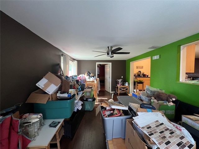 interior space with dark hardwood / wood-style floors and ceiling fan