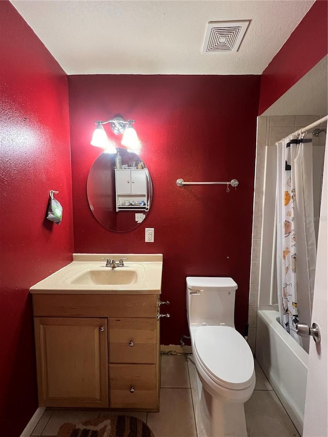 full bathroom with shower / tub combo with curtain, tile patterned floors, toilet, a textured ceiling, and vanity