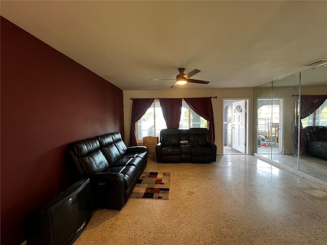 living room with ceiling fan