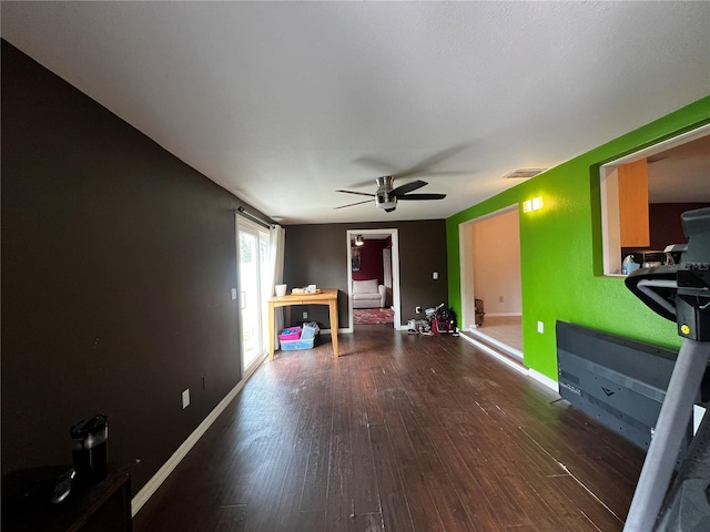 interior space featuring ceiling fan and hardwood / wood-style floors