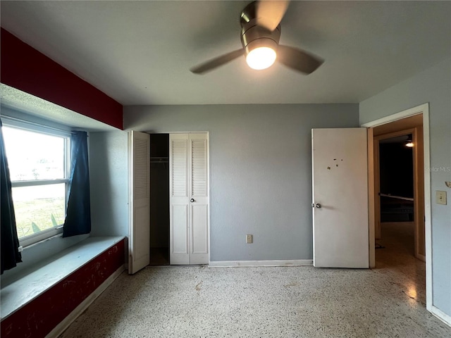 unfurnished bedroom featuring a closet and ceiling fan