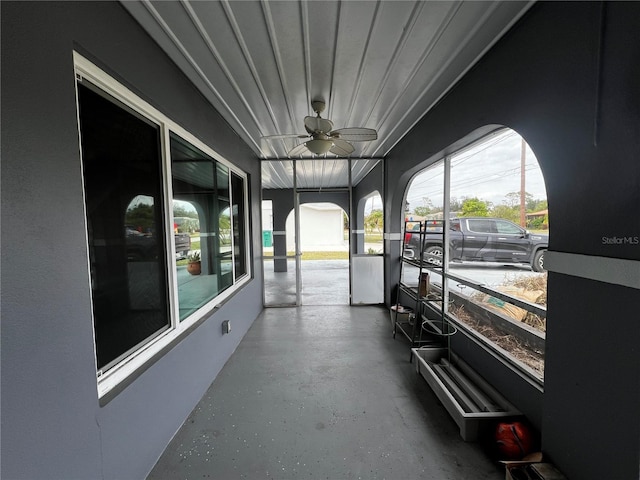 1405 Dorchester St, Port Charlotte, FL 33952 - unfurnished sunroom with plenty of natural light and arched walkways