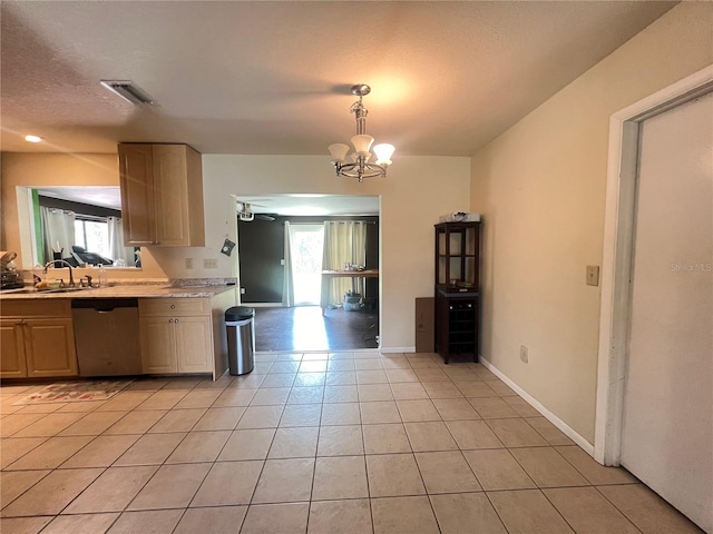1405 Dorchester St, Port Charlotte, FL 33952 - kitchen featuring dishwasher, a sink, healthy amount of natural light, and light countertops