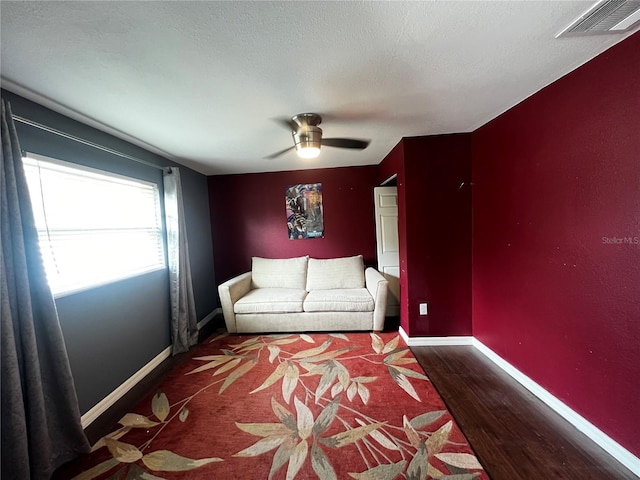 1405 Dorchester St, Port Charlotte, FL 33952 - sitting room featuring a ceiling fan and baseboards