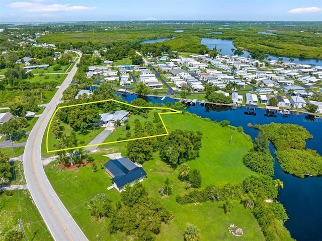 aerial view featuring a water view and a residential view