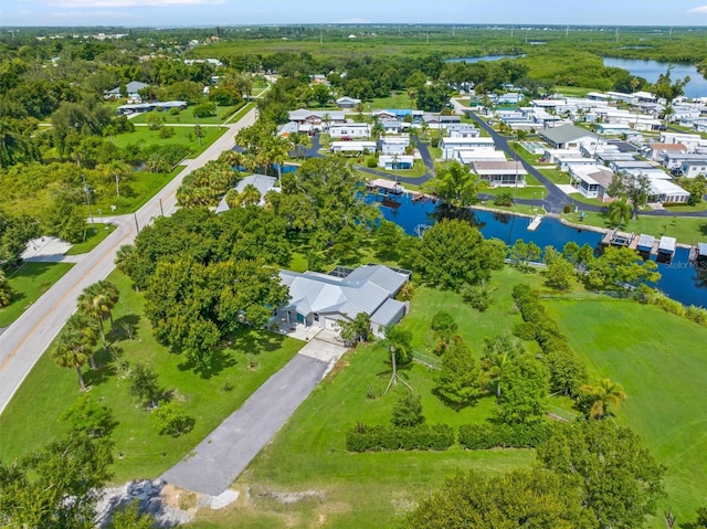 drone / aerial view with a water view