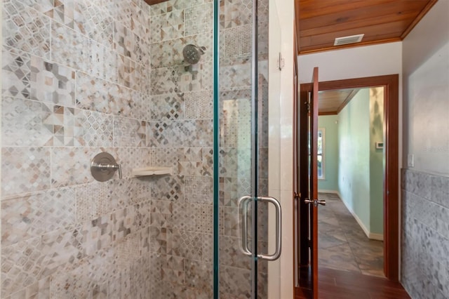 8516 Riverside Dr, Punta Gorda, FL 33982 - bathroom featuring crown molding, visible vents, and a shower stall