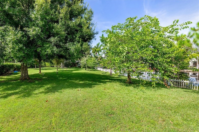 view of yard with fence