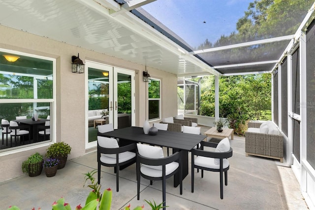 8516 Riverside Dr, Punta Gorda, FL 33982 - sunroom featuring an outdoor living space, outdoor dining area, and french doors