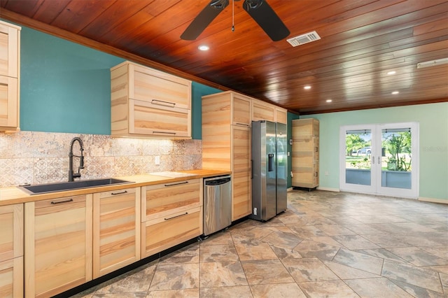 kitchen with ceiling fan, sink, light brown cabinets, and appliances with stainless steel finishes