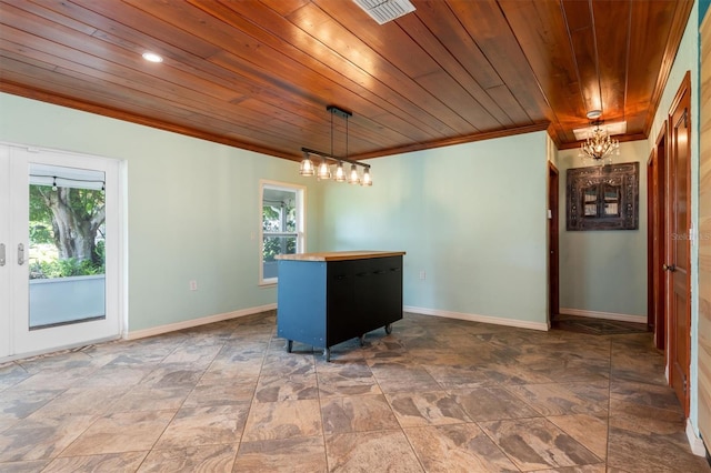 interior space with ornamental molding, a chandelier, and wooden ceiling